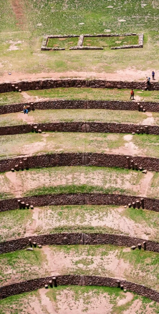 Tourists Admiring the Terrace System at the Moray Archaeological Site