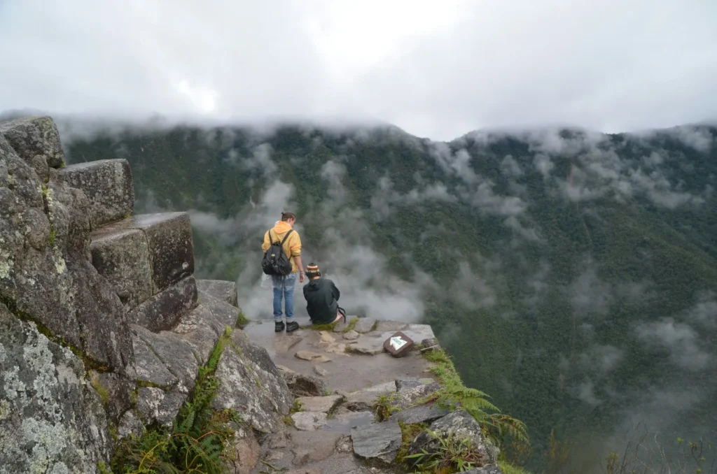 Tourists resting on Huayna Picchu Mountain