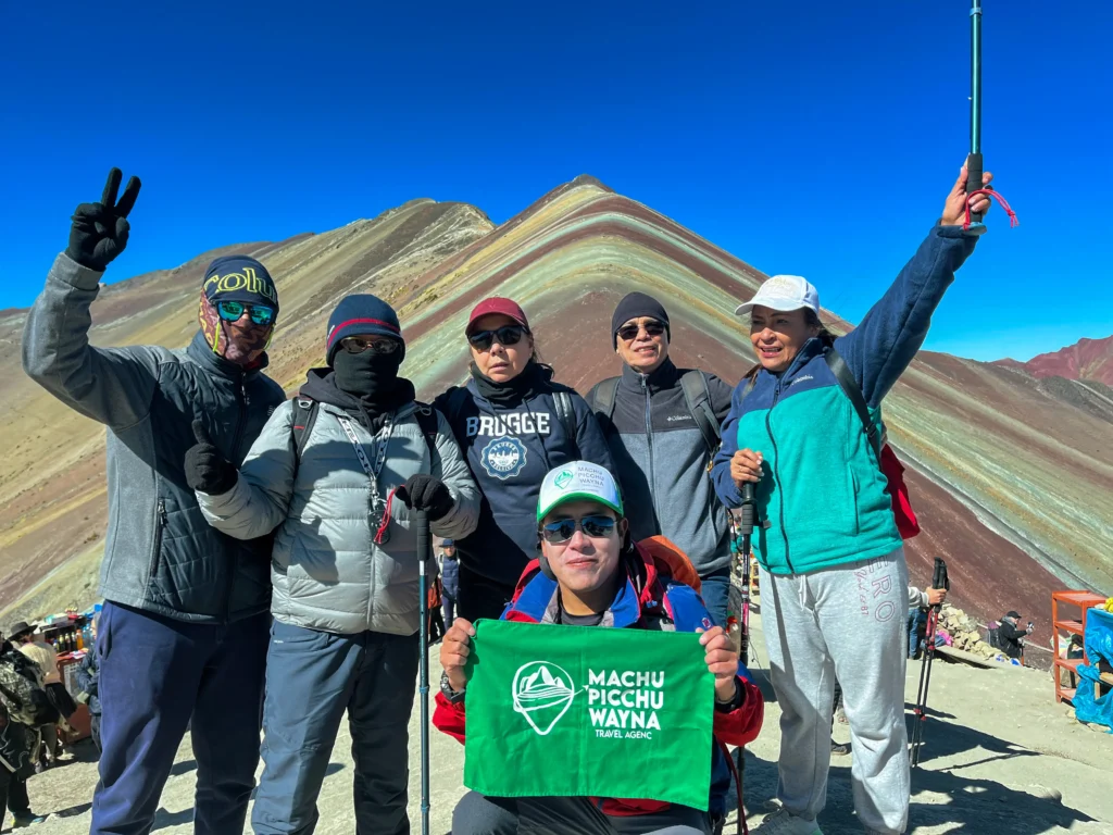 Tourists with their necessary gear for the hike to Rainbow Mountain