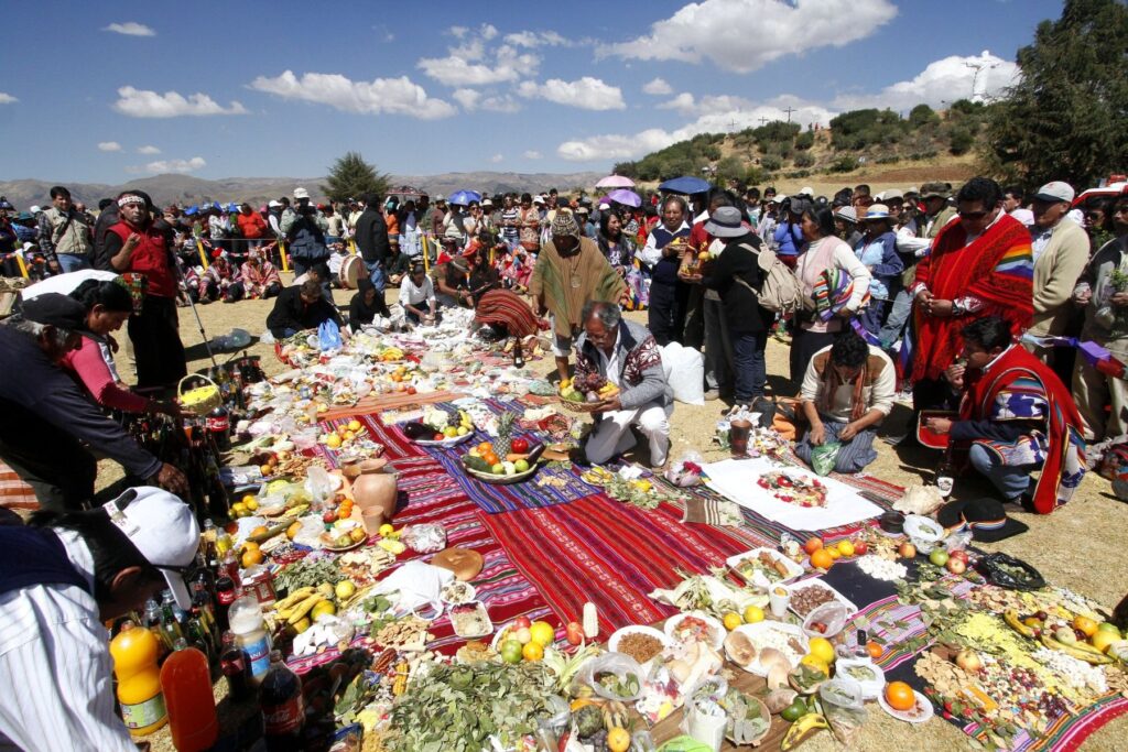 pachama ofrenda 1 Offering ceremony to Pachamama during the Andean New Year with coca and flowers