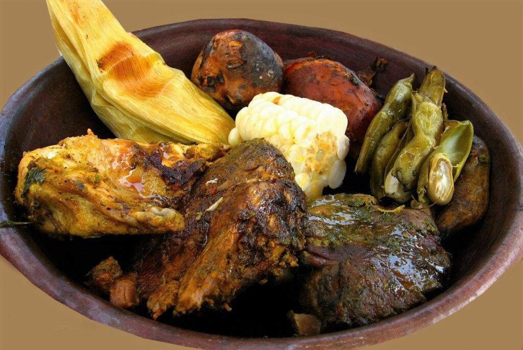 pachamanca Traditional pachamanca served in a clay pot with native potatoes and Andean meats