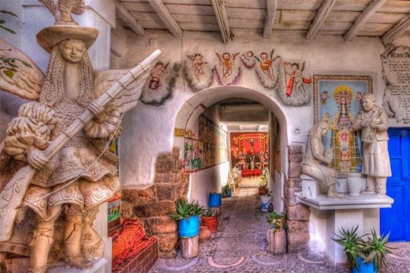 Cobblestone street and art workshops in San Blas neighborhood, Cusco