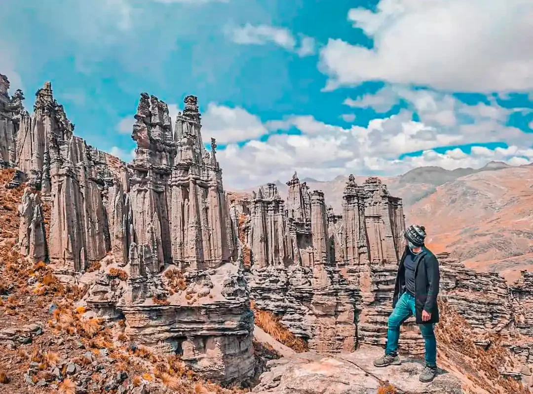 Tourist taking photos in the Stone Forest of Macusani