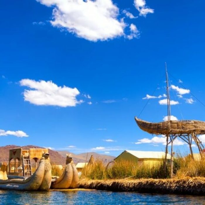 Boats and floating islands made of reeds known as totora on Lake Titicaca in Peru